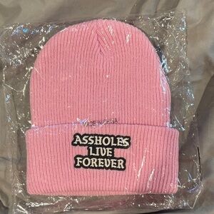 New- Never worn Assholes live forever Pink Beanie with Embroidered Text. SzOS
